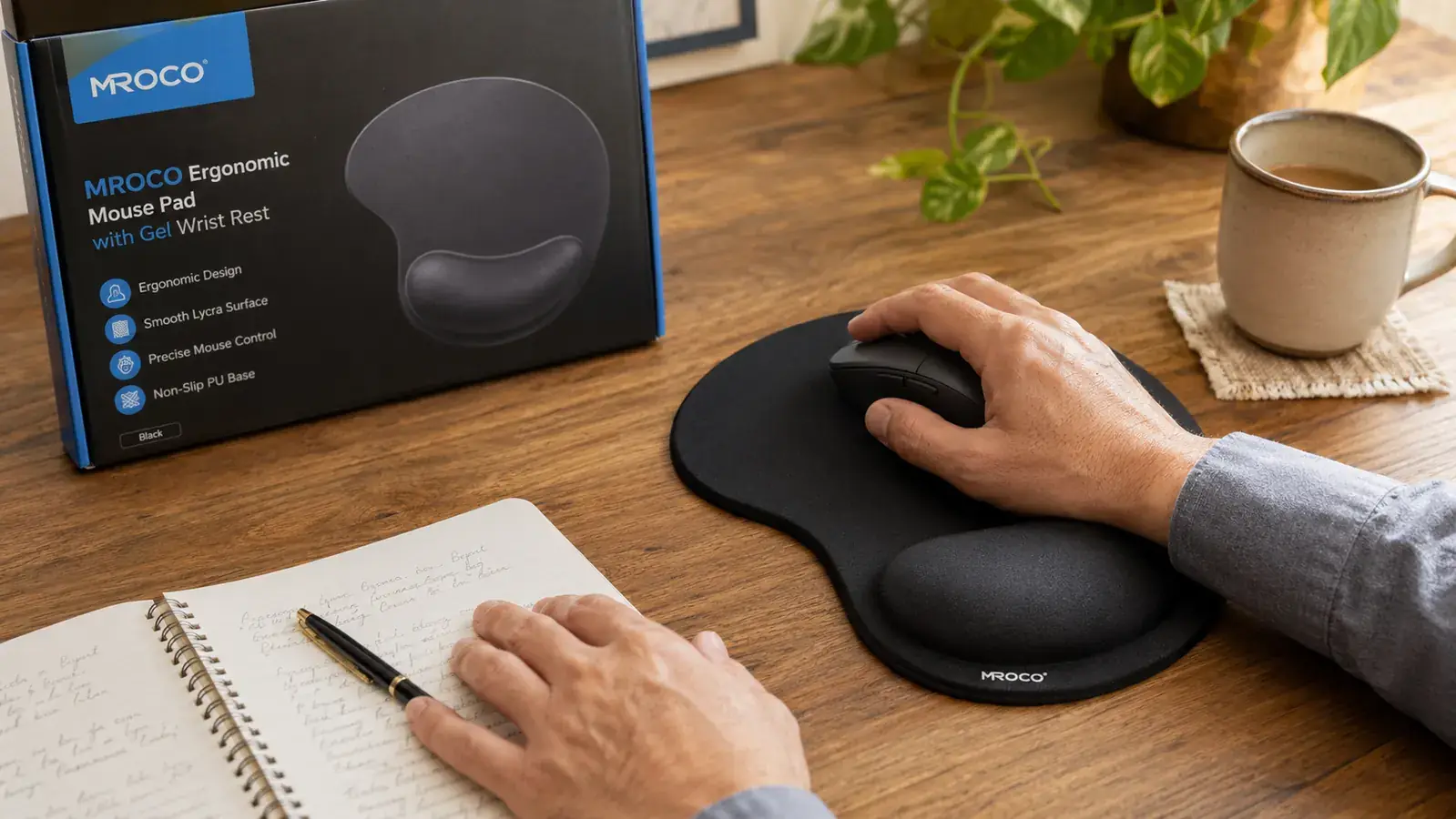 Hand resting on the MROCO gel wrist rest mouse pad while using a wireless mouse